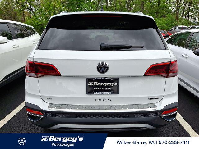 used 2023 Volkswagen Taos car, priced at $23,495