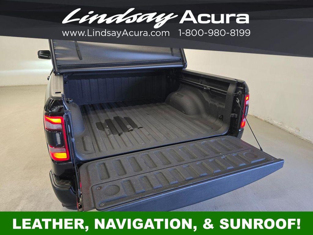 used 2021 Ram 1500 car, priced at $35,477