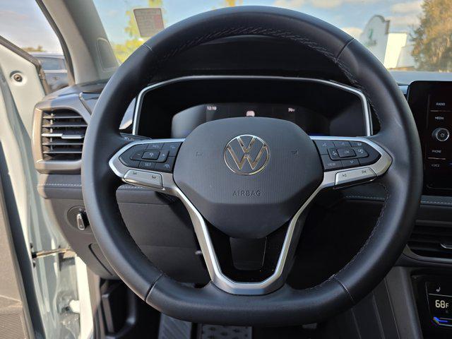 used 2025 Volkswagen Taos car, priced at $26,495
