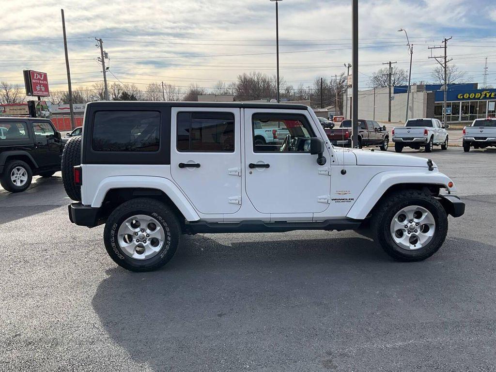 used 2013 Jeep Wrangler Unlimited car, priced at $15,975