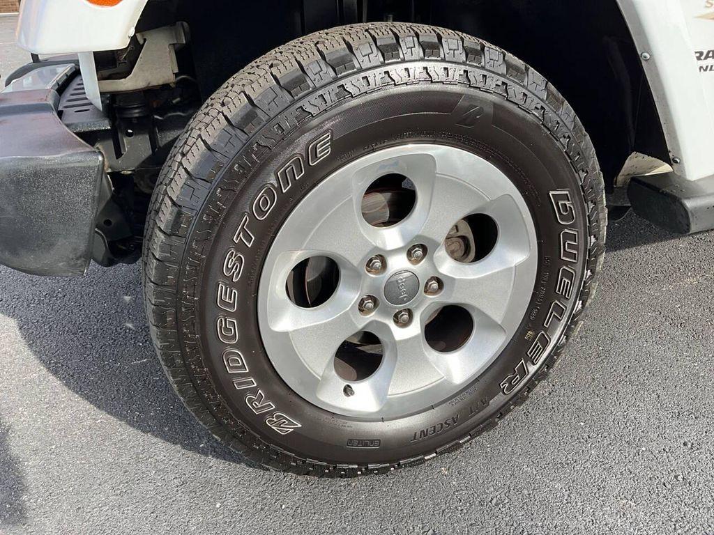 used 2013 Jeep Wrangler Unlimited car, priced at $15,975