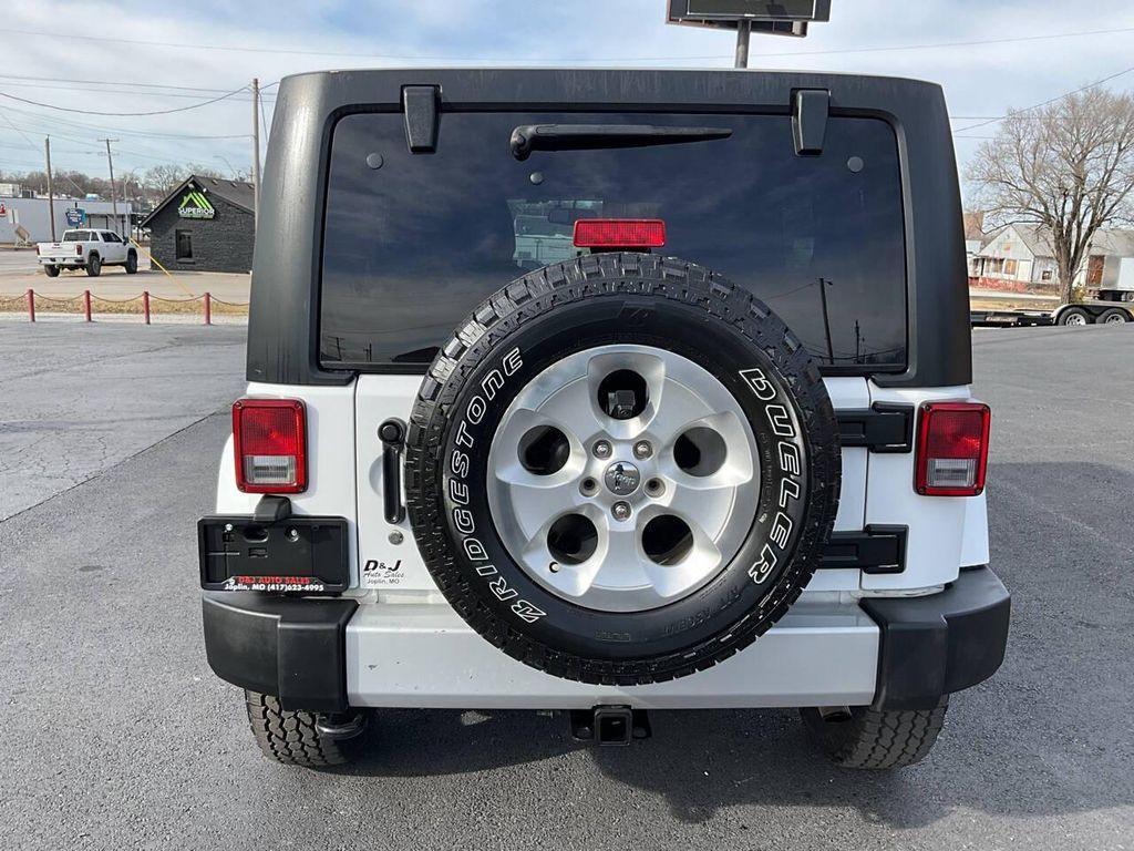 used 2013 Jeep Wrangler Unlimited car, priced at $15,975