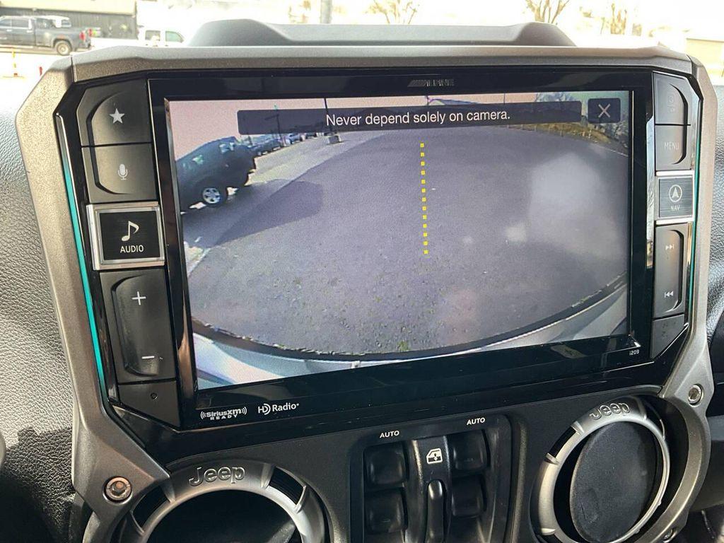 used 2013 Jeep Wrangler Unlimited car, priced at $15,975