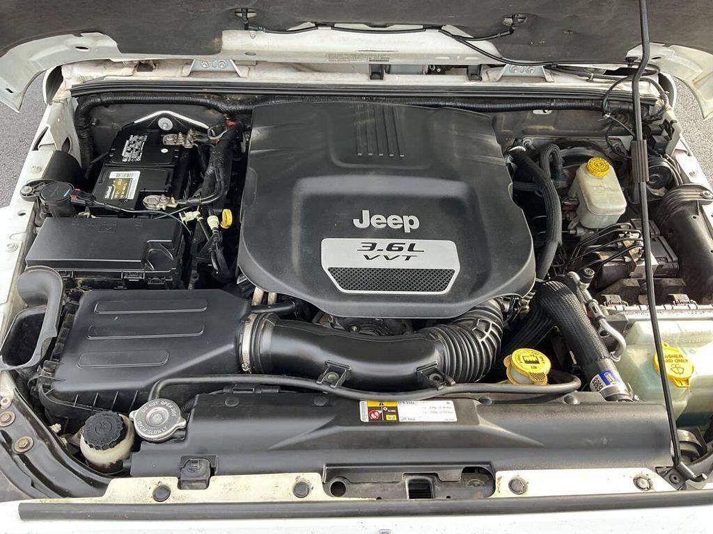 used 2013 Jeep Wrangler Unlimited car, priced at $15,975