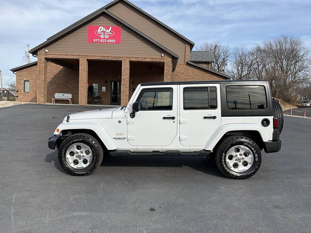 used 2013 Jeep Wrangler Unlimited car, priced at $15,975