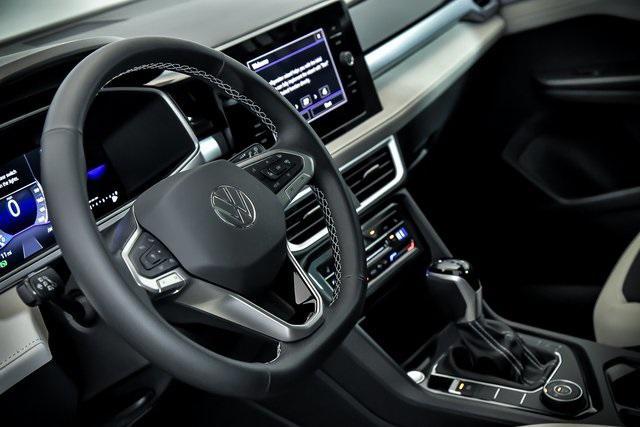 used 2025 Volkswagen Taos car, priced at $26,999