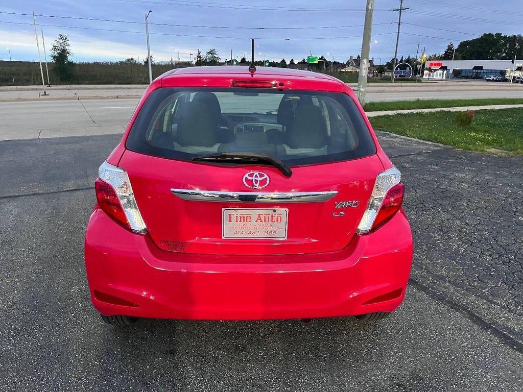 2014 Absolutely Red Toyota Yaris