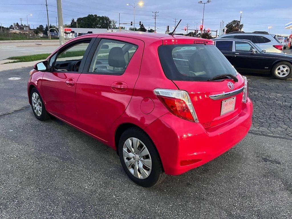 2014 Absolutely Red Toyota Yaris