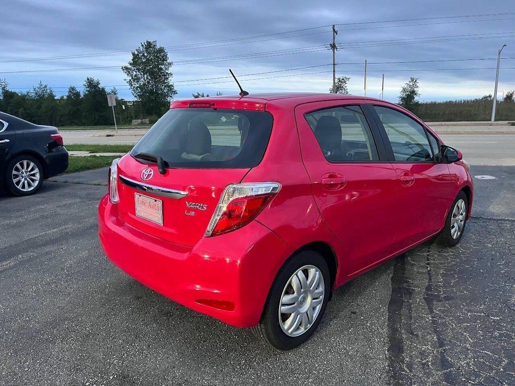 2014 Absolutely Red Toyota Yaris