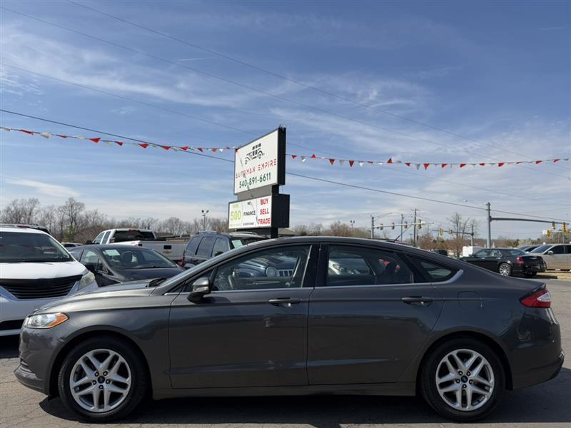 used 2016 Ford Fusion car, priced at $7,992