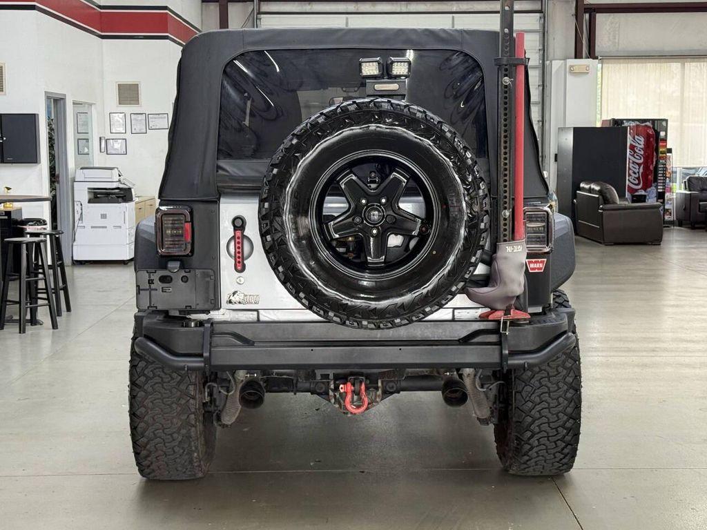 used 2014 Jeep Wrangler Unlimited car, priced at $21,998