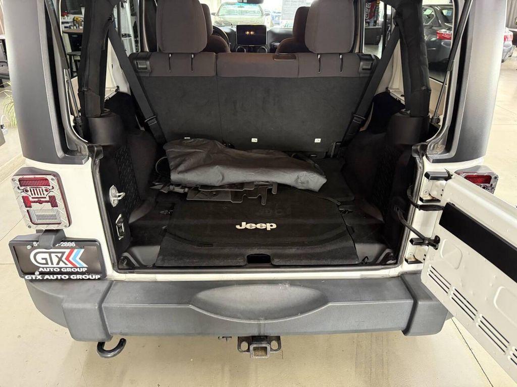 used 2014 Jeep Wrangler Unlimited car, priced at $18,288