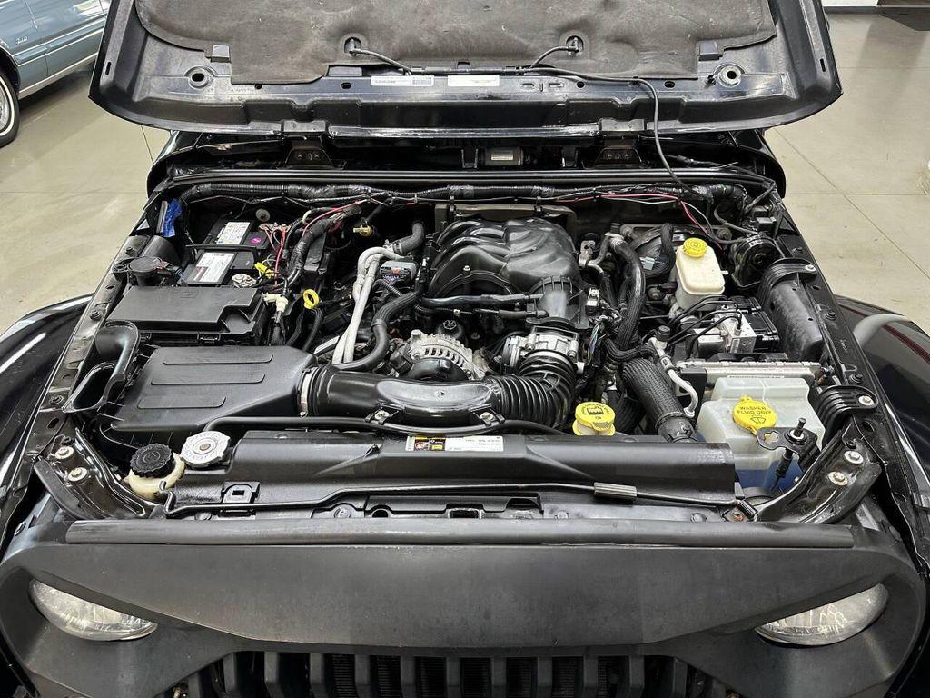 used 2015 Jeep Wrangler Unlimited car, priced at $9,497