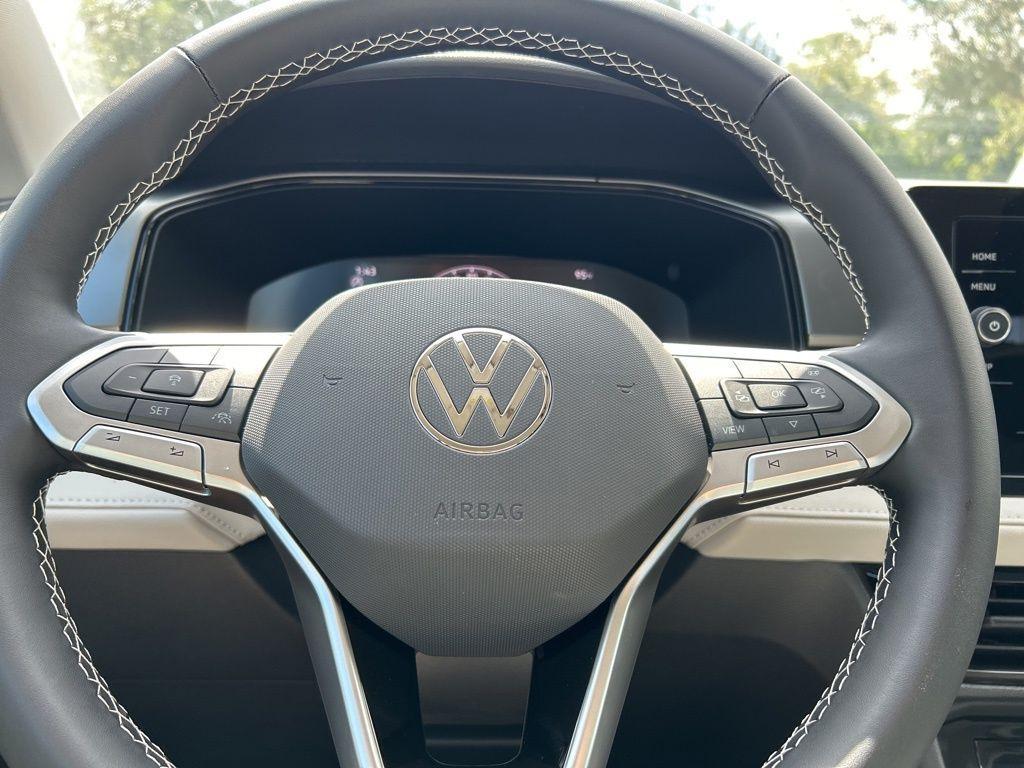 new 2025 Volkswagen Taos car, priced at $20,843