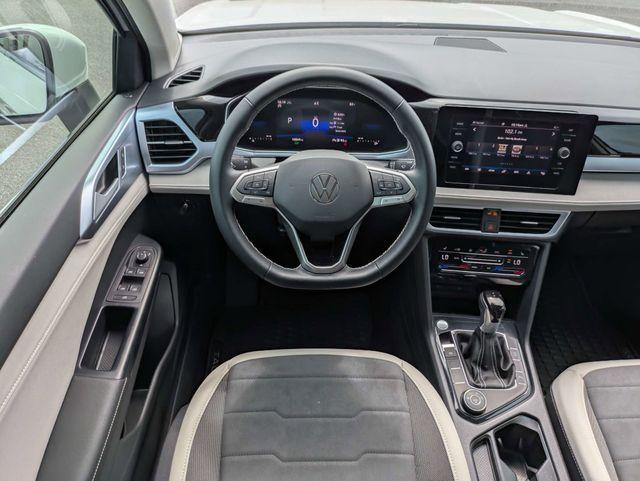 used 2025 Volkswagen Taos car, priced at $25,488