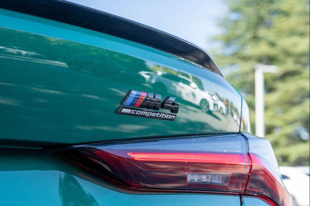 used 2023 BMW M4 car, priced at $80,654
