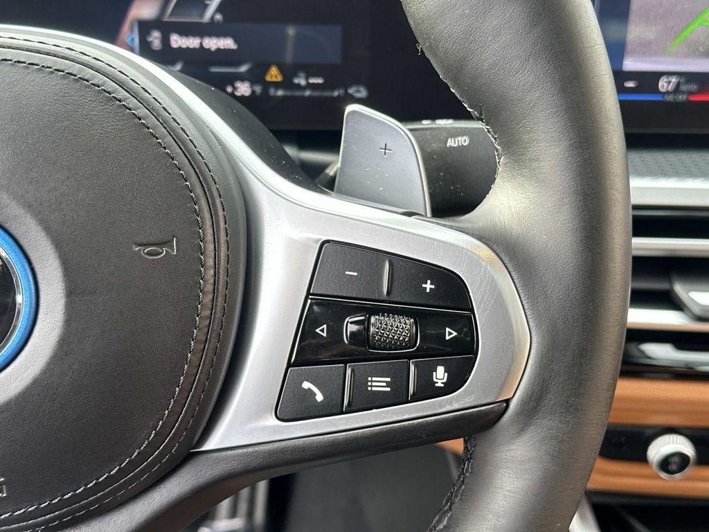 used 2023 BMW 330e car, priced at $27,731