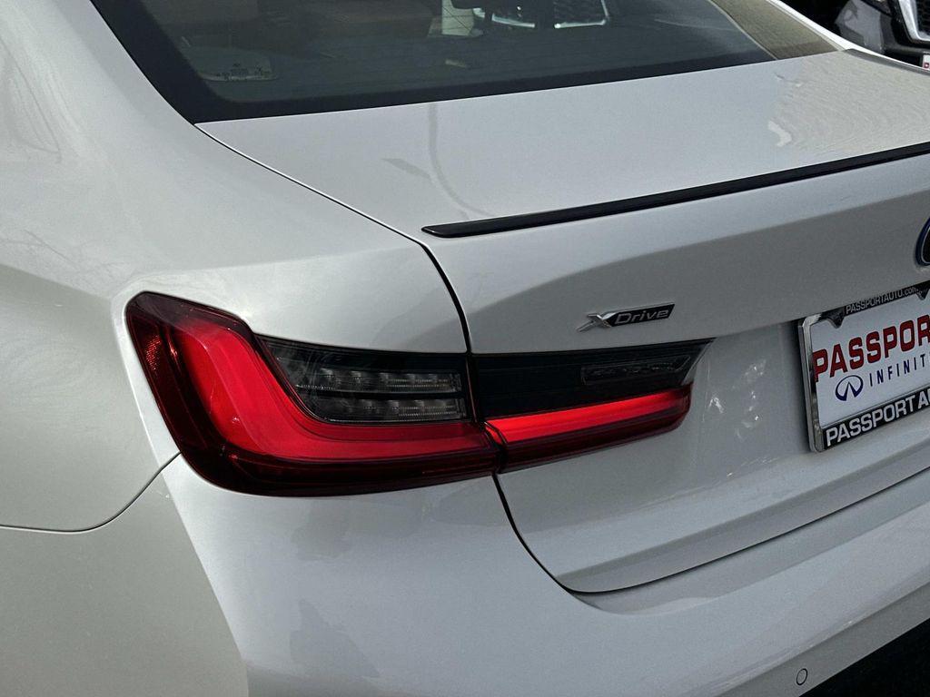 used 2023 BMW 330e car, priced at $27,731