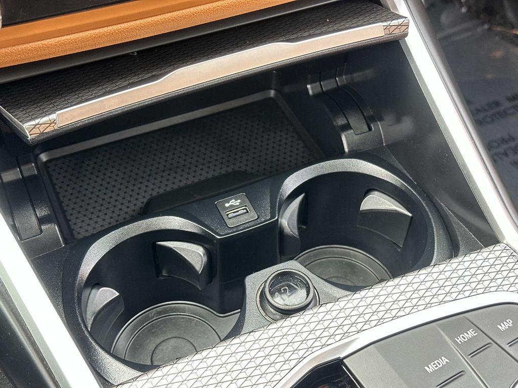 used 2023 BMW 330e car, priced at $27,731