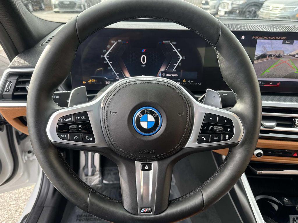 used 2023 BMW 330e car, priced at $27,731
