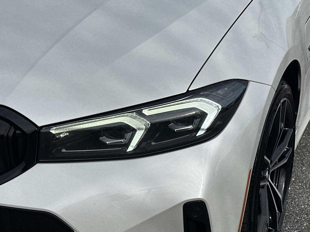 used 2023 BMW 330e car, priced at $27,731