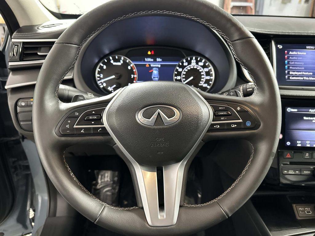 used 2023 INFINITI QX50 car, priced at $30,211