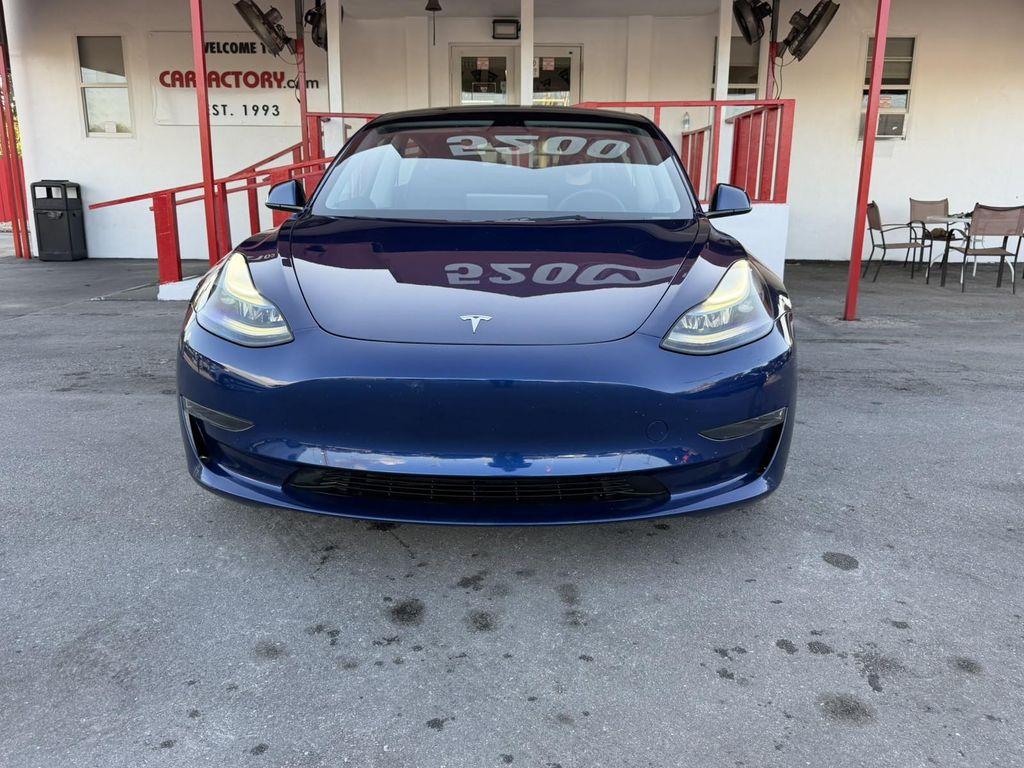 used 2023 Tesla Model 3 car, priced at $26,100