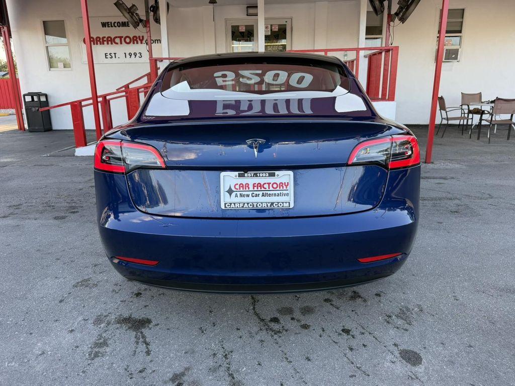 used 2023 Tesla Model 3 car, priced at $26,100