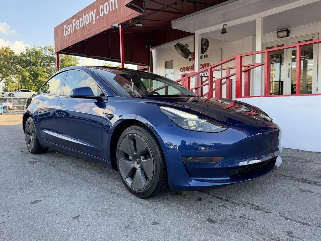 used 2023 Tesla Model 3 car, priced at $26,100