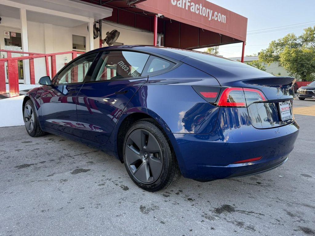 used 2023 Tesla Model 3 car, priced at $26,100