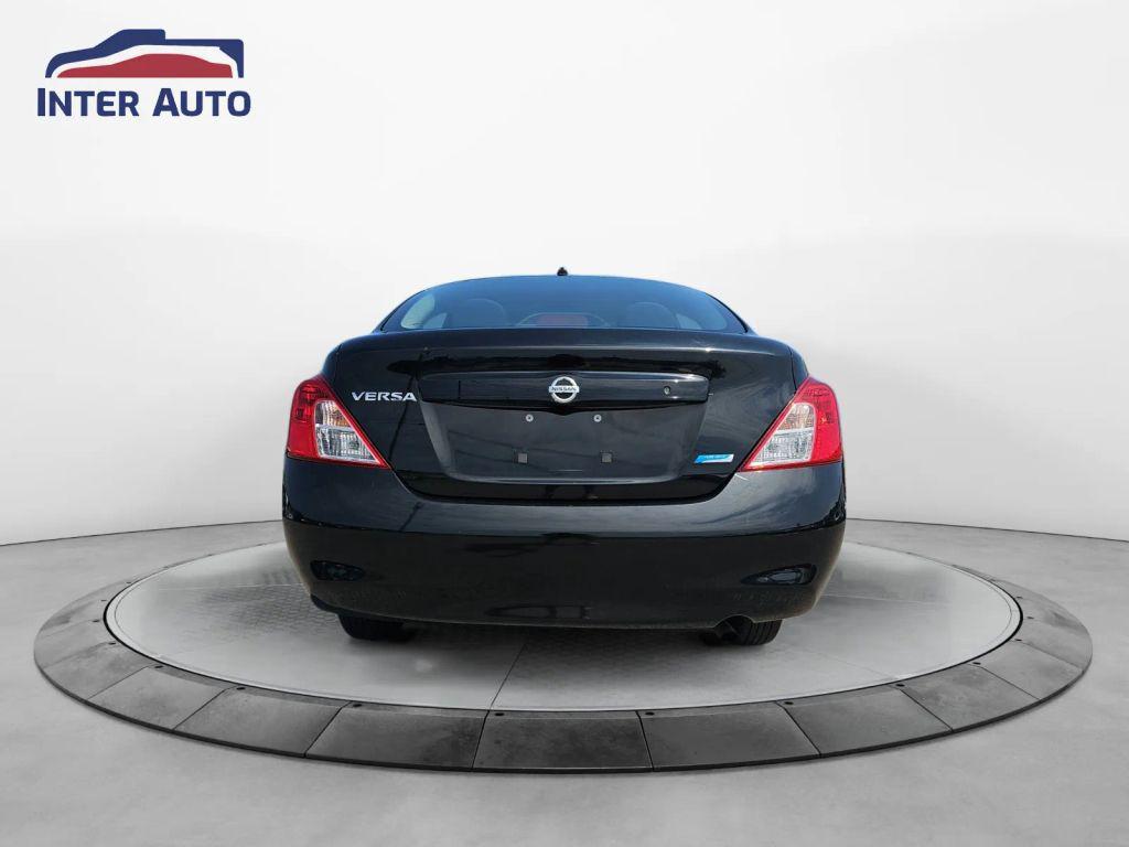 used 2013 Nissan Versa car, priced at $5,299