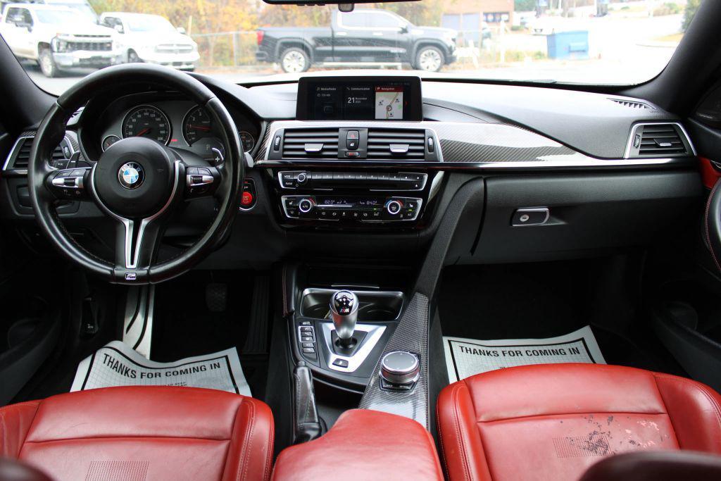 used 2018 BMW M4 car, priced at $37,899