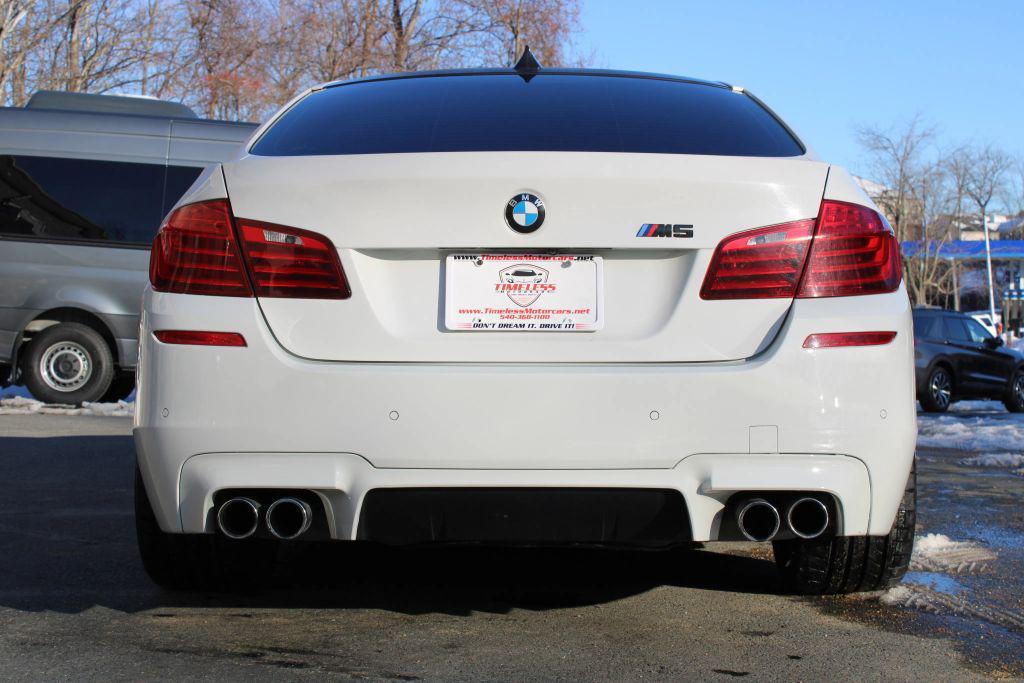 used 2016 BMW M5 car, priced at $27,877