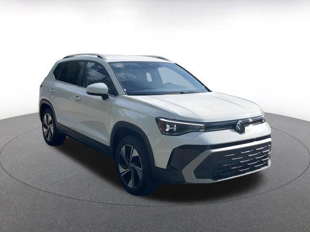 used 2025 Volkswagen Taos car, priced at $22,991