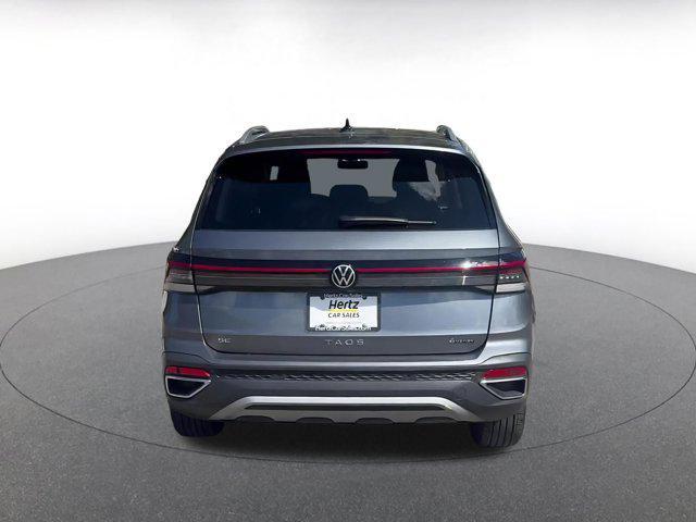 used 2025 Volkswagen Taos car, priced at $24,679