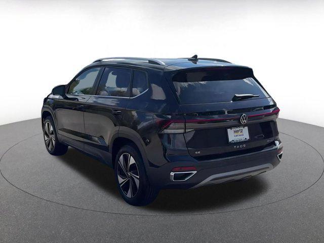 used 2025 Volkswagen Taos car, priced at $24,854