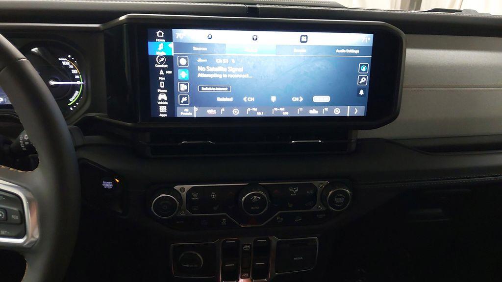 used 2024 Jeep Wrangler 4xe car, priced at $38,906