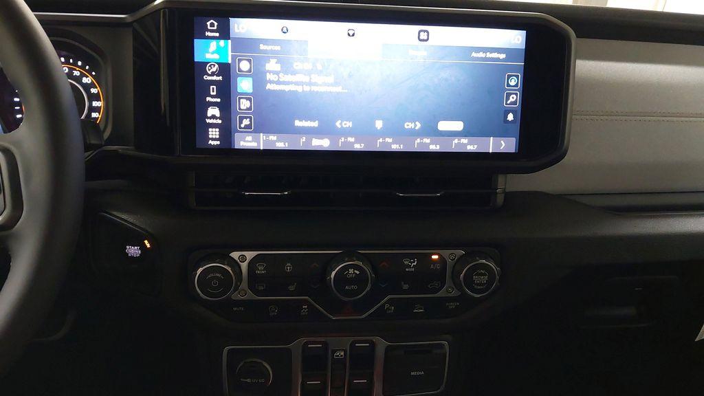 used 2024 Jeep Wrangler car, priced at $46,124