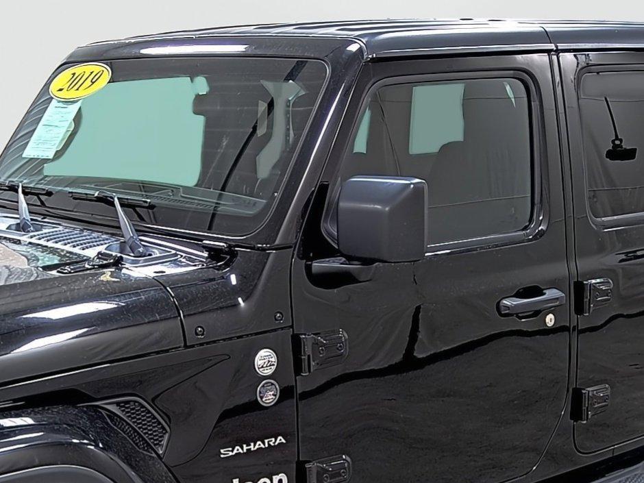 used 2019 Jeep Wrangler Unlimited car, priced at $29,604