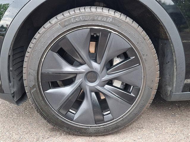used 2025 Tesla Model Y car, priced at $36,155