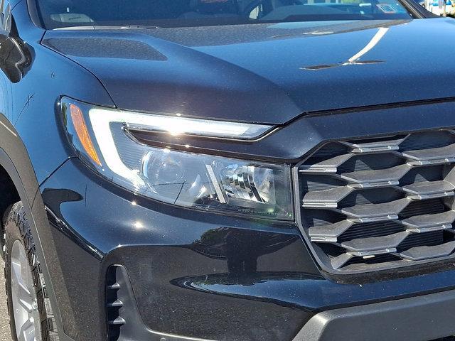 used 2025 Honda Ridgeline car, priced at $40,495