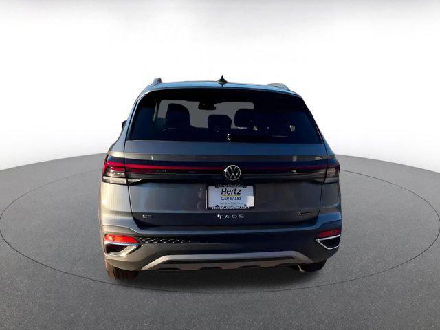 used 2025 Volkswagen Taos car, priced at $22,939