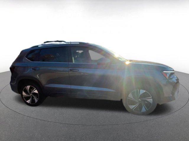 used 2025 Volkswagen Taos car, priced at $22,939