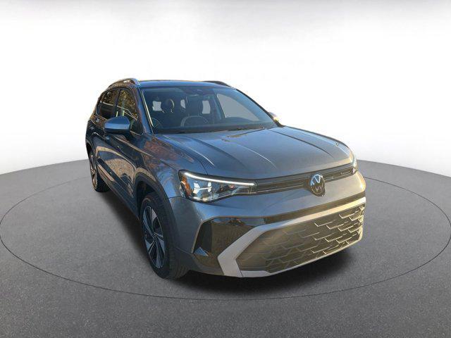 used 2025 Volkswagen Taos car, priced at $22,939