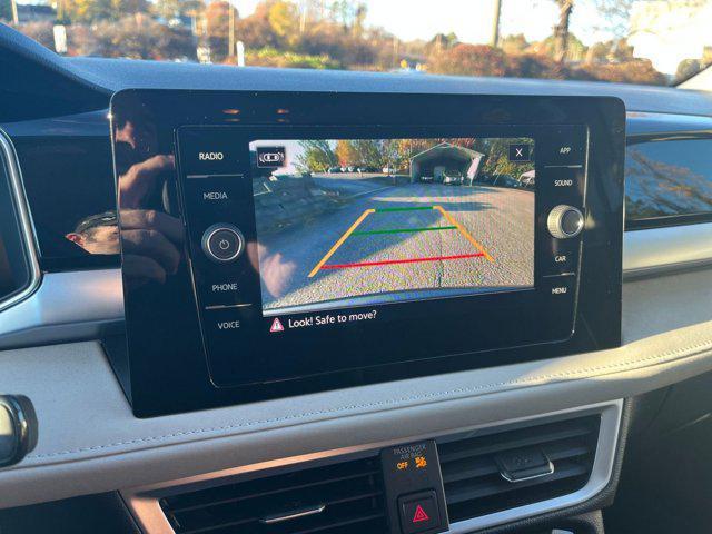 used 2025 Volkswagen Taos car, priced at $22,939