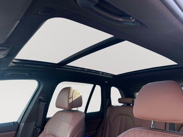 used 2025 BMW X5 car, priced at $52,180