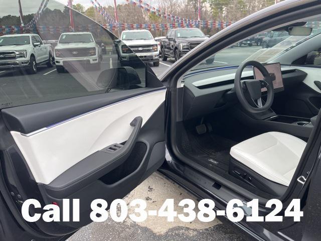 used 2025 Tesla Model 3 car, priced at $35,104