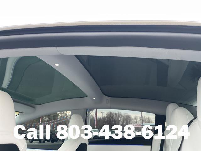 used 2025 Tesla Model 3 car, priced at $35,104