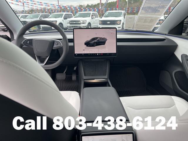 used 2025 Tesla Model 3 car, priced at $35,104