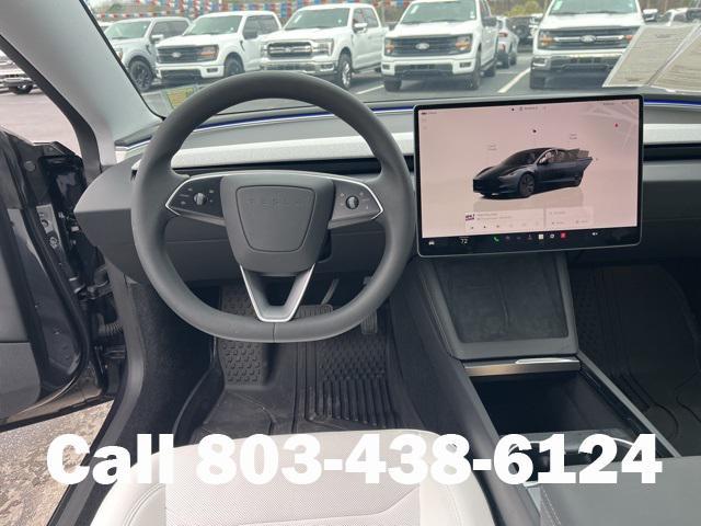 used 2025 Tesla Model 3 car, priced at $35,104